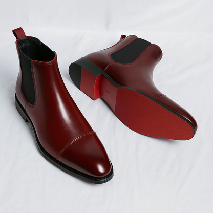 High-quality men's black leather Chelsea boots, modern dress footwear.