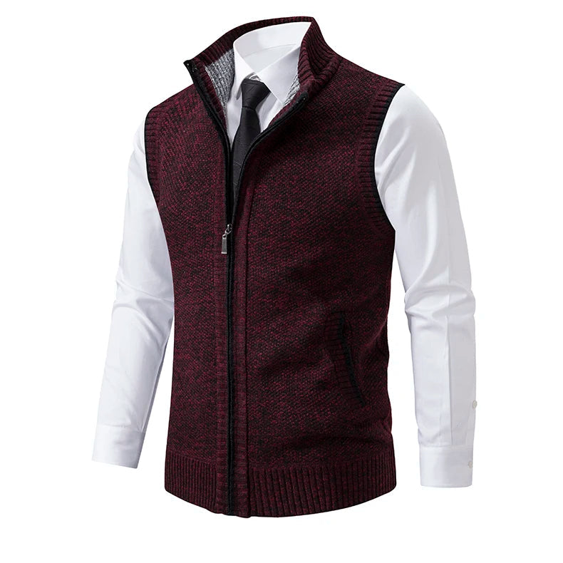 Sophisticated men's full-zip wool blend vest, accented with a classic plaid lining. Ideal for layering outerwear.