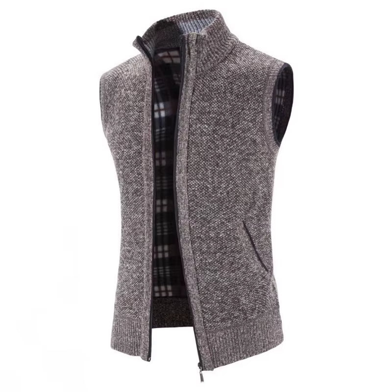 Versatile men's full-zip wool blend vest. Features cozy plaid lining, excellent for outerwear layering.