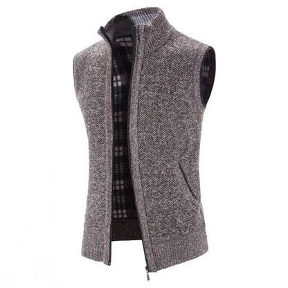 Versatile men's full-zip wool blend vest. Features cozy plaid lining, excellent for outerwear layering.