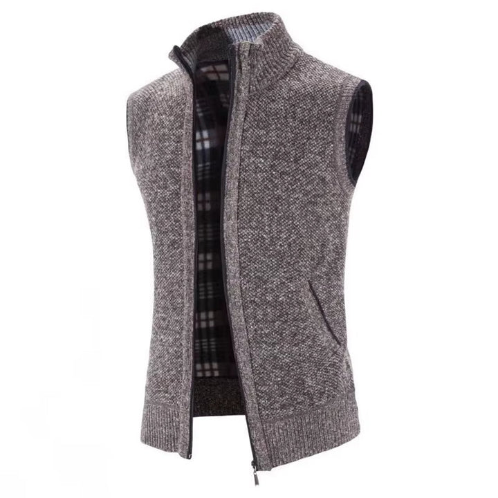 Versatile men's full-zip wool blend vest. Features cozy plaid lining, excellent for outerwear layering.