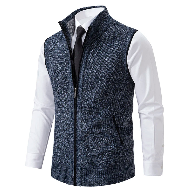 Full-zip men's wool blend vest. Interior boasts a vibrant plaid lining, perfect for men's fashion layering.