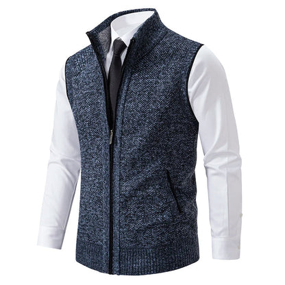 Full-zip men's wool blend vest. Interior boasts a vibrant plaid lining, perfect for men's fashion layering.