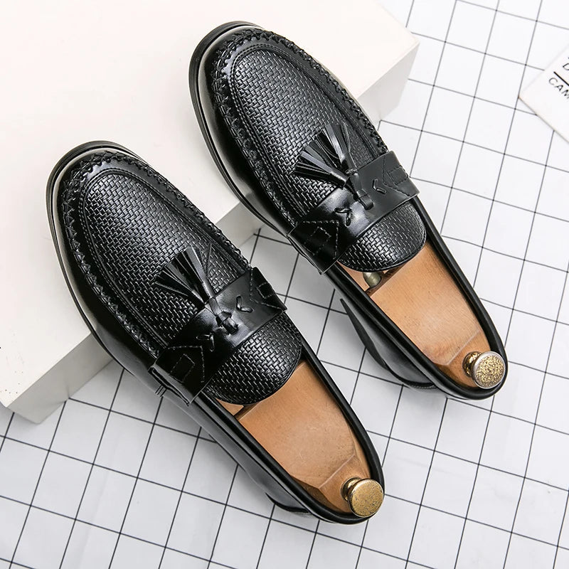 Versatile men's tassel loafers, showcasing a refined woven pattern for a polished look.