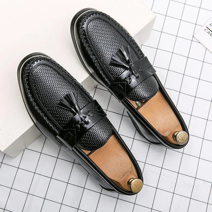 Versatile men's tassel loafers, showcasing a refined woven pattern for a polished look.