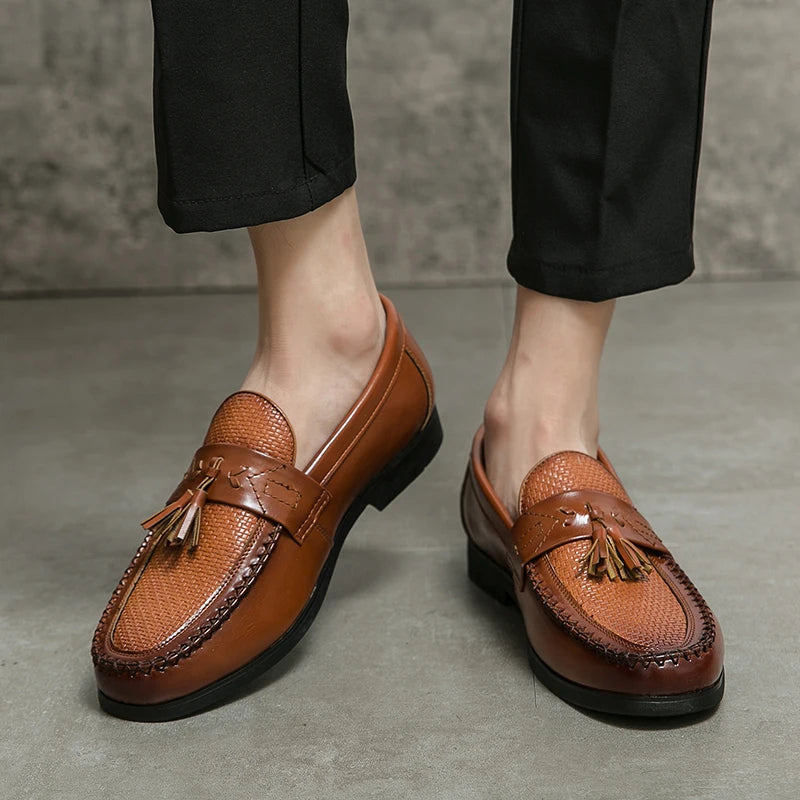 Elegant men's formal footwear: woven tassel loafers designed for a refined appearance.