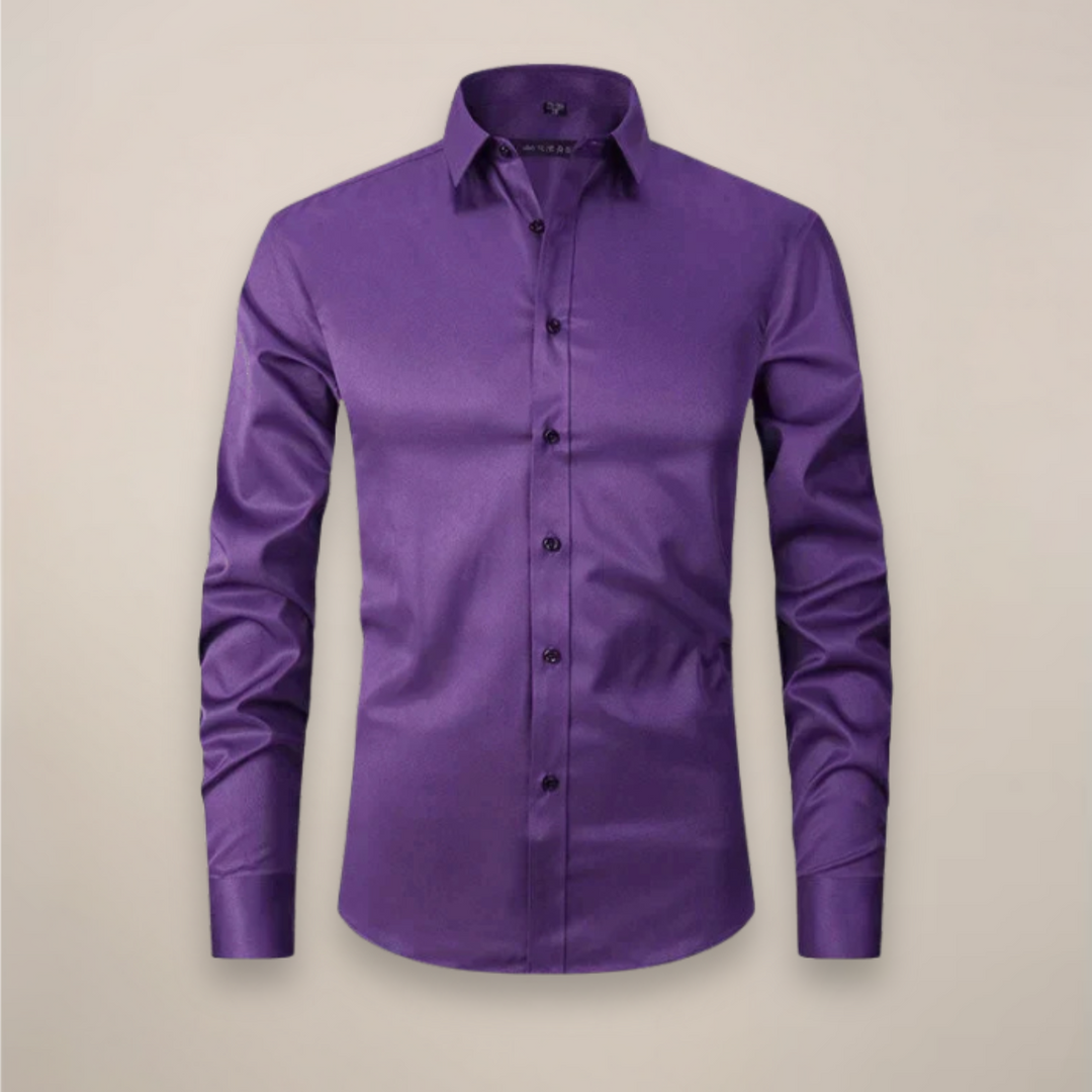 Detail of cuff on men's wrinkle-free long-sleeve button-up, professional style.