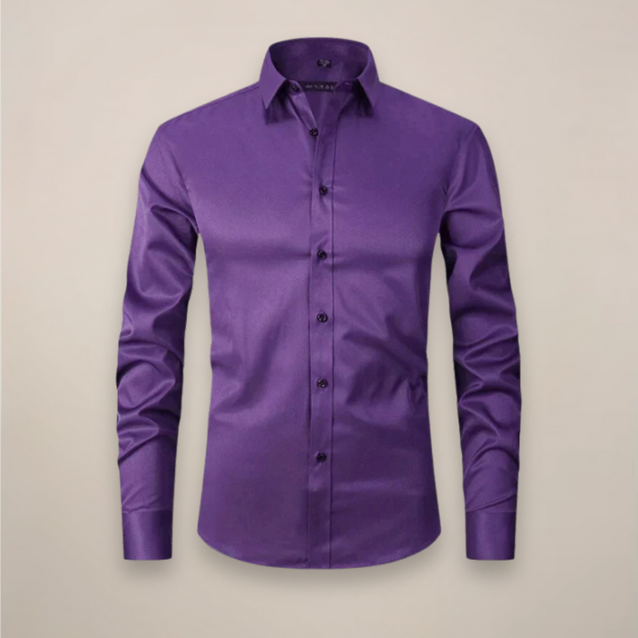 Detail of cuff on men's wrinkle-free long-sleeve button-up, professional style.