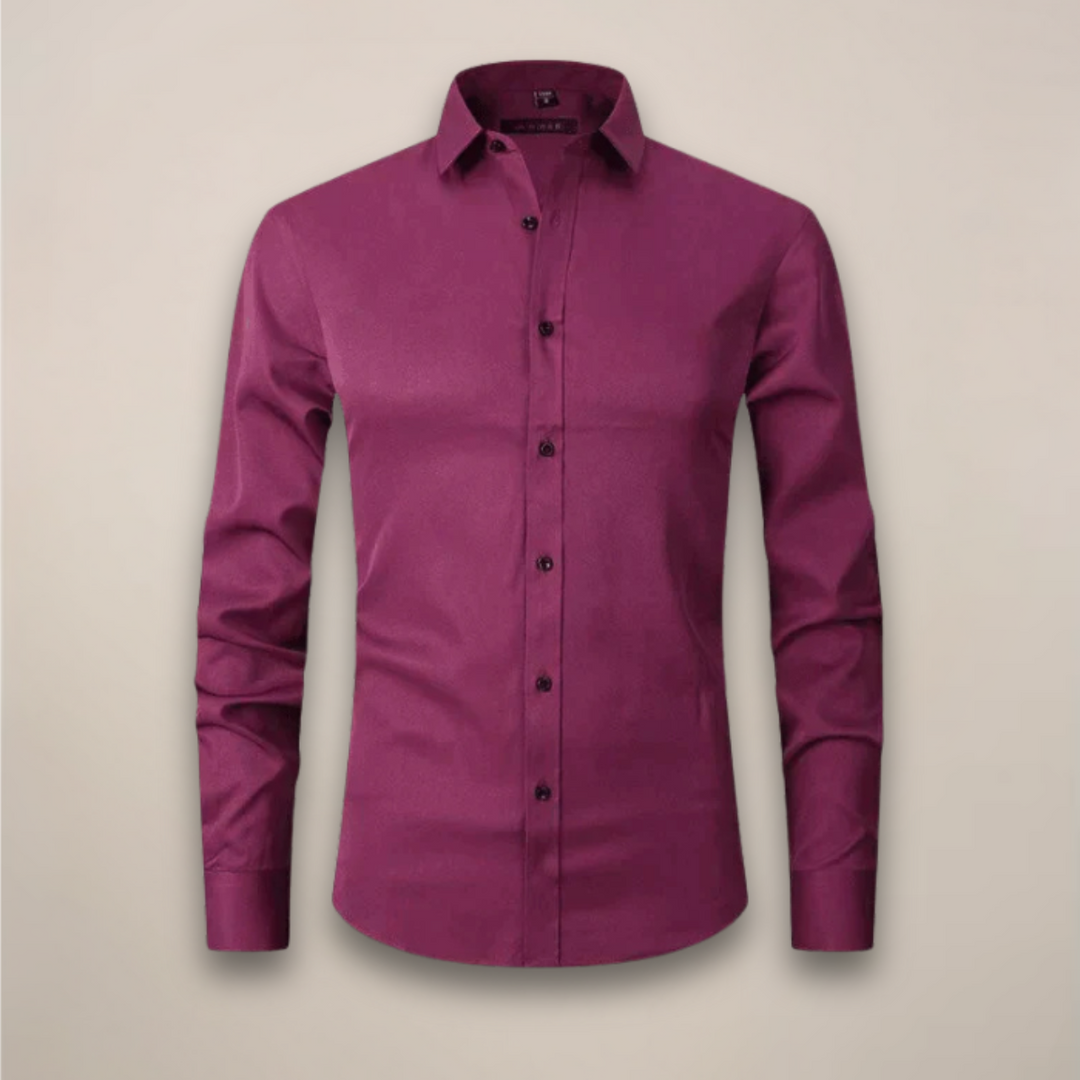 Men's wrinkle-free long-sleeve button-up shirt, laid flat, showcasing easy care fabric.