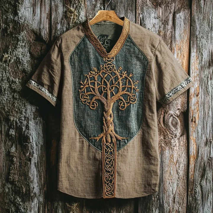 Men's Yggdrasil embroidered short sleeve shirt, dark fabric, unique mythic design for casual wear.