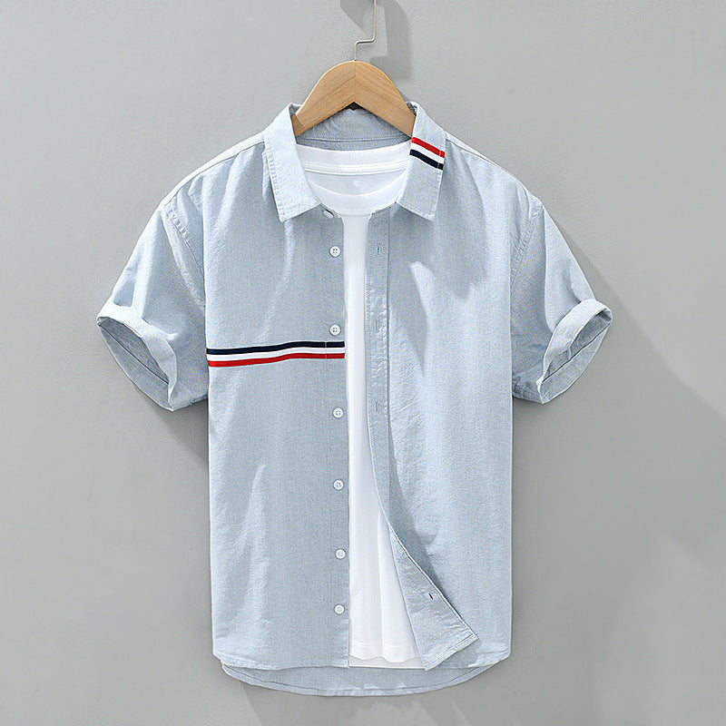 Versatile Men's Zen striped short sleeve button-down shirt. Relaxed fit for casual everyday wear in summer.