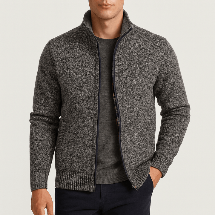 Man wearing a sleek zip-collar knit cardigan, showcasing versatile smart casual style for autumn fashion.