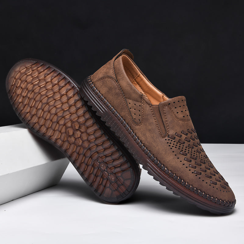 Classic mens slip-on shoes, hand-stitched for durability and sophisticated casual fashion.