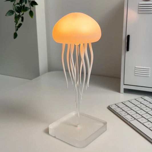 Mesmerizing jellyfish lamp creating a calming ambiance. Dynamic LED mood light, perfect for home decor & relaxation.