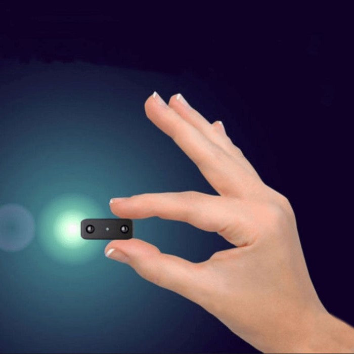 Mini HD covert security camera with audio, night vision & motion detection for discreet home surveillance.