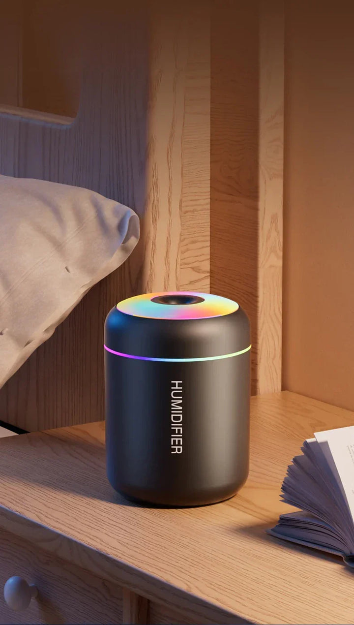 Portable mini USB humidifier & aroma diffuser. Refreshing mist for car, office, home, travel.