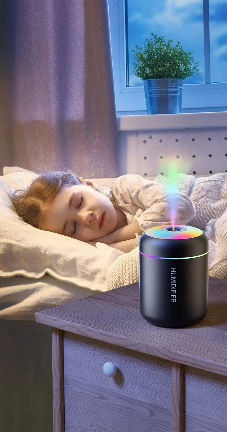 Close-up of compact mini USB humidifier & aromatherapy diffuser. Ideal for personal space, travel.