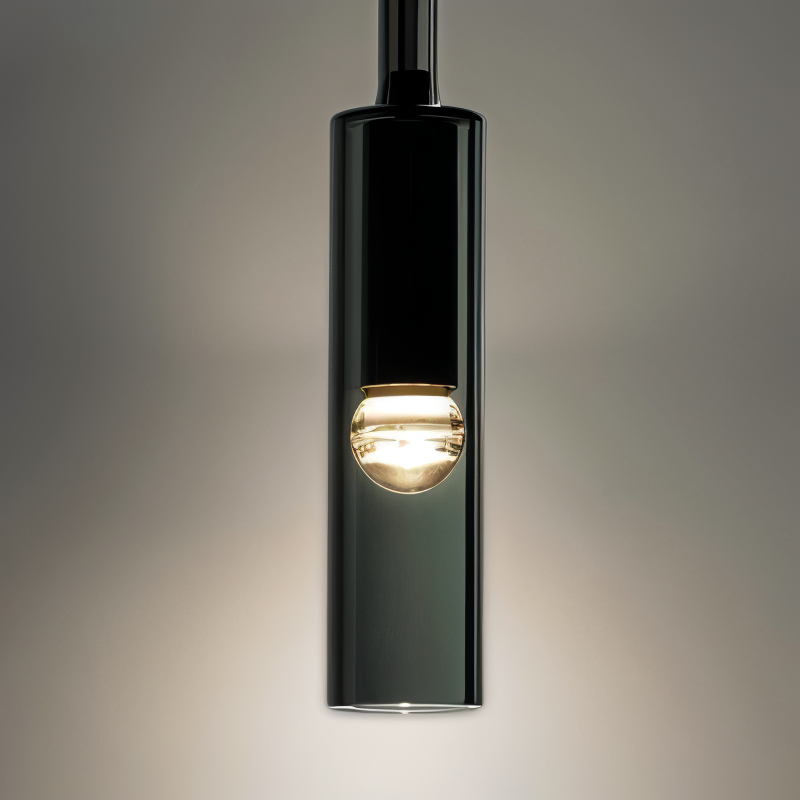 Elegant minimalist Orvane wall lamp featuring smoke glass for a refined, modern look & gentle ambient lighting.