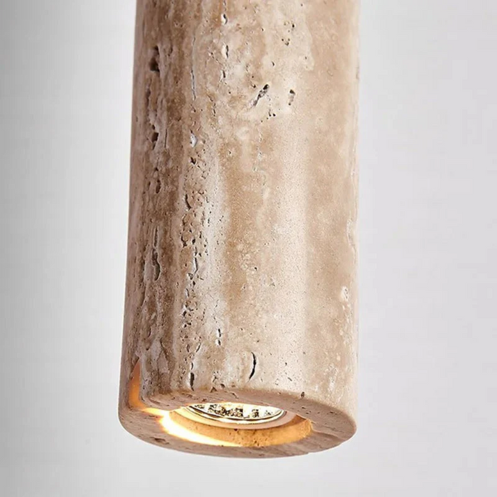 Wabi-Sabi style LED chandelier featuring natural travertine, ideal minimalist home lighting for bedrooms.