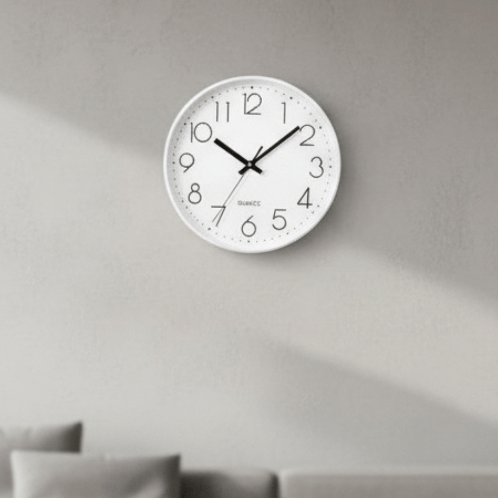 Modern 12-inch silent quartz wall clock, ideal for contemporary home decor in living rooms.