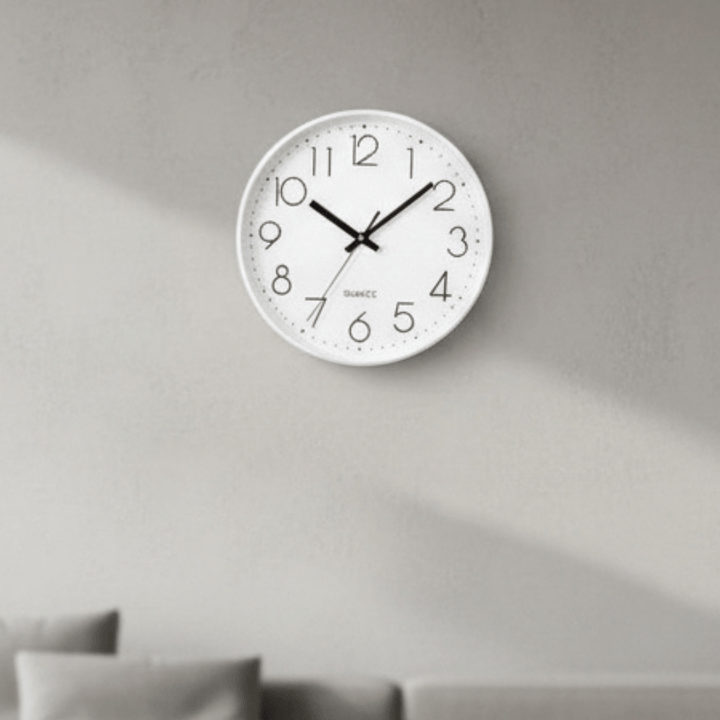 Modern 12-inch silent quartz wall clock, ideal for contemporary home decor in living rooms.