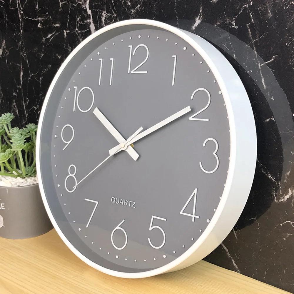 Minimalist 12-inch non-ticking wall clock with quartz movement, perfect for quiet bedrooms.