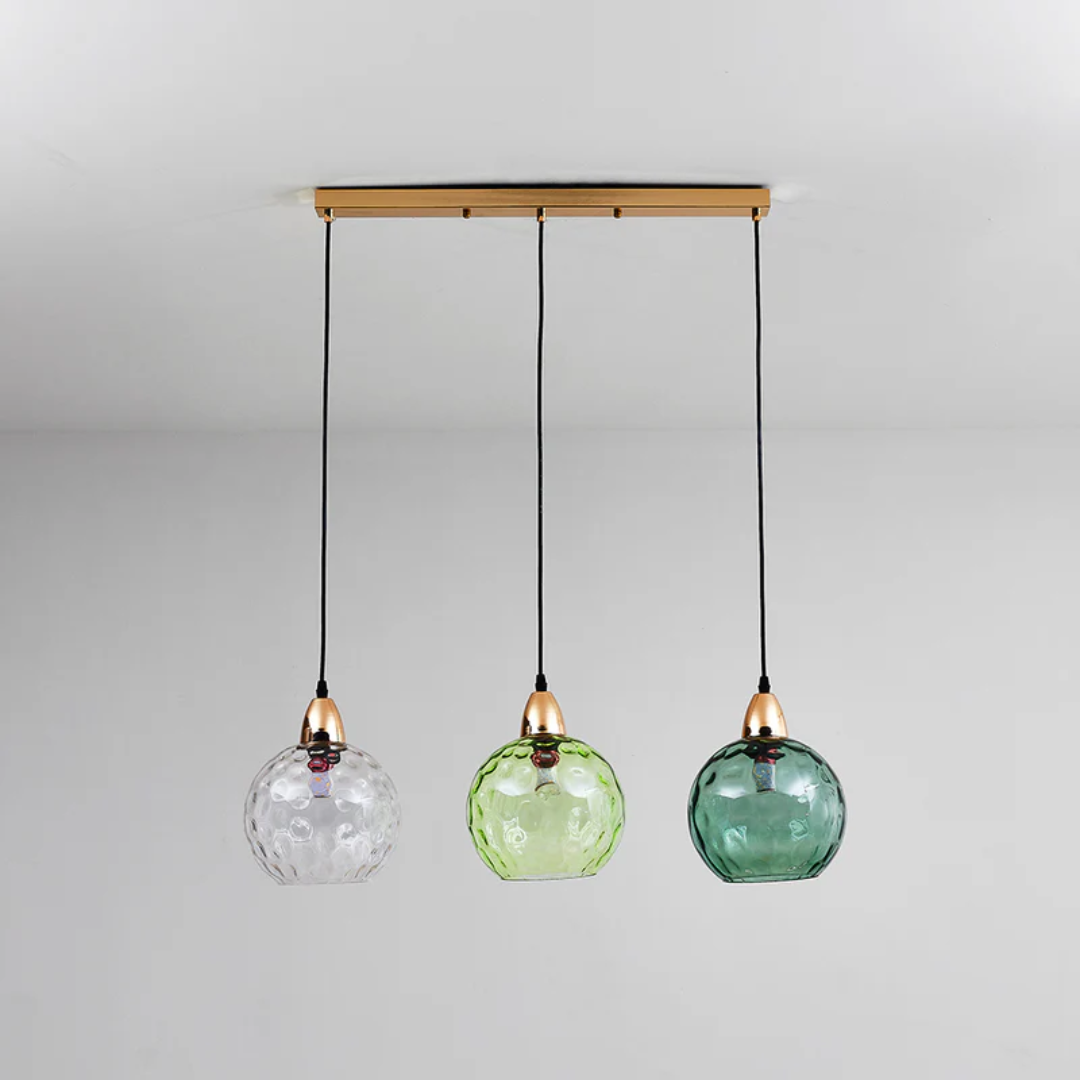 Modern 3-lamp cascade pendant light, elegant ceiling fixture for contemporary home decor.