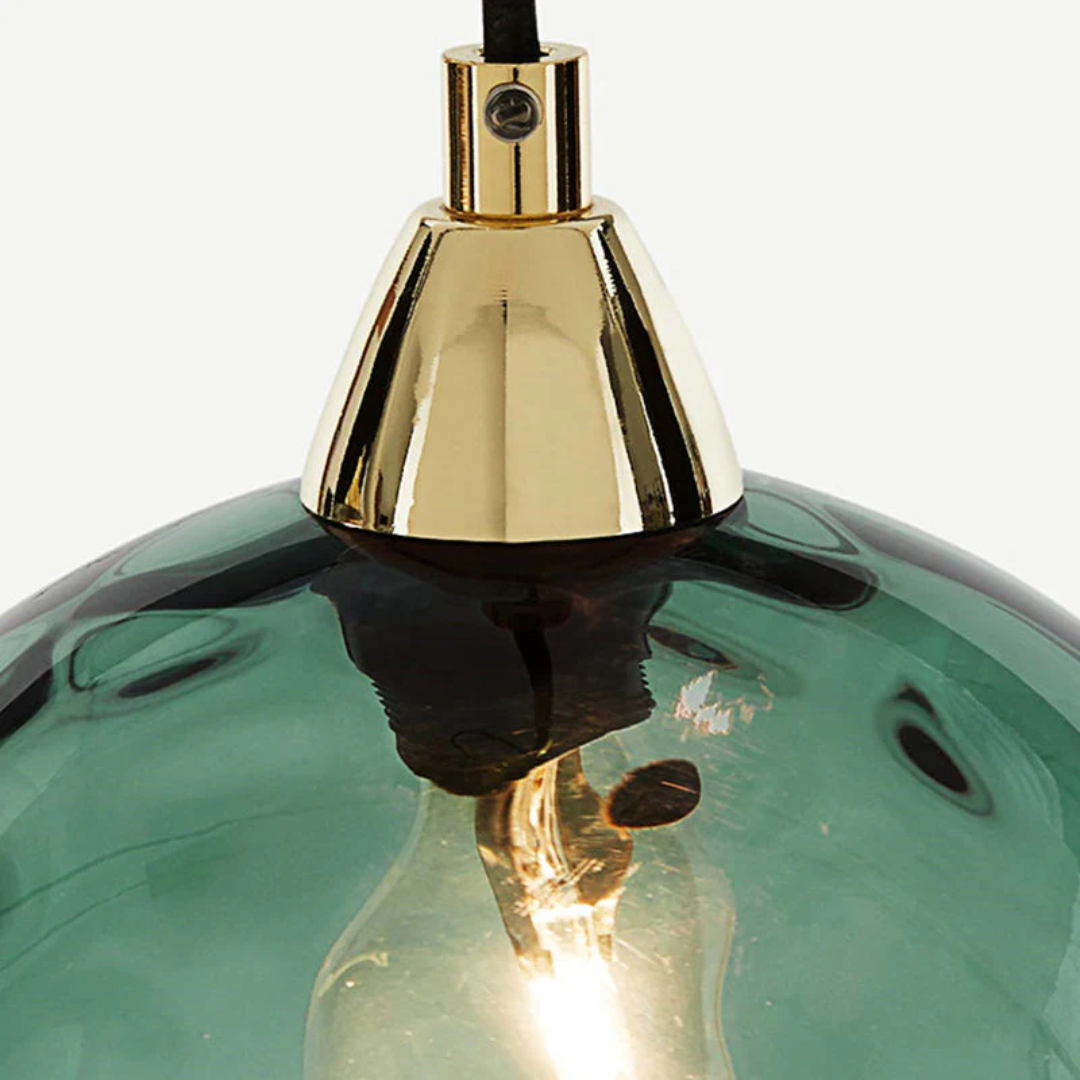 Adjustable modern 3-lamp pendant light, sleek cluster design for contemporary spaces.