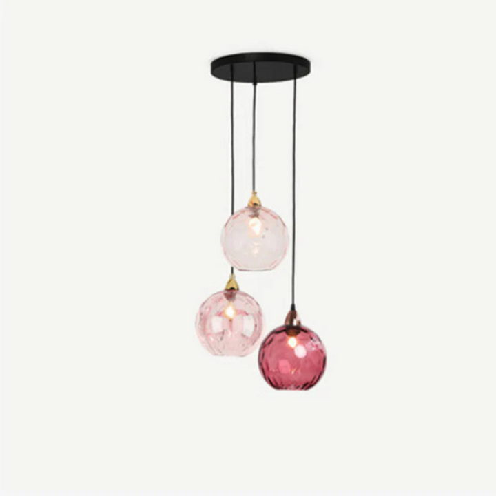Contemporary cluster pendant light, 3-lamp cascade design, a focal point in home decor.