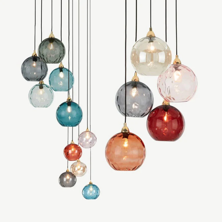Sleek modern cascade light, three lamps forming a stylish cluster ceiling fixture.