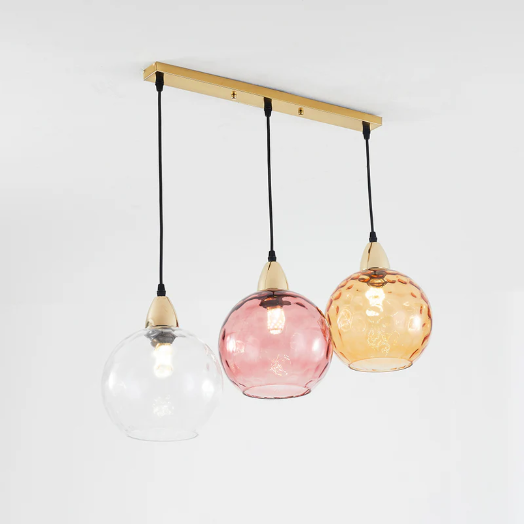 Adjustable 3-lamp cascade pendant light, versatile modern lighting solution.