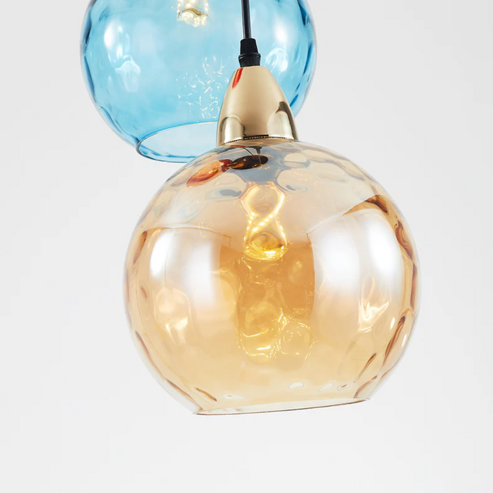 Indoor modern pendant light, 3-lamp cascade design, excellent for dining room.