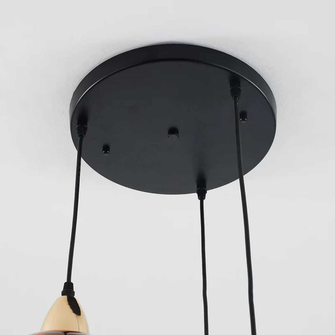 Stylish cluster pendant light, three individual lamps creating a cascade effect.