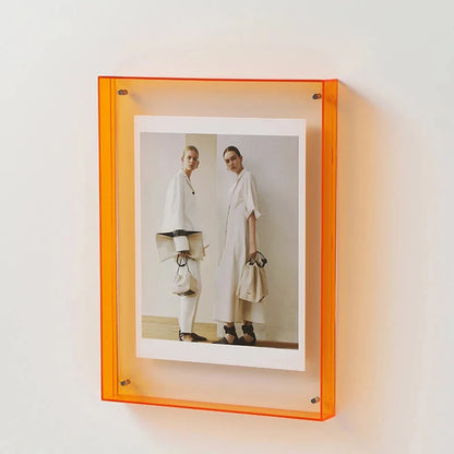 Contemporary acrylic photo frame with vivid, colorful edges, enhancing any wall as a striking decor piece.