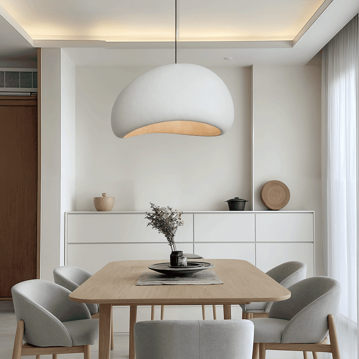 Modern minimalist adjustable LED pendant light, enhances contemporary living space home decor.