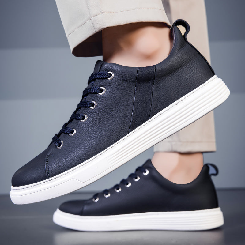 White men's modern sneakers, cushioned for everyday comfort. Stylish and versatile casual footwear.