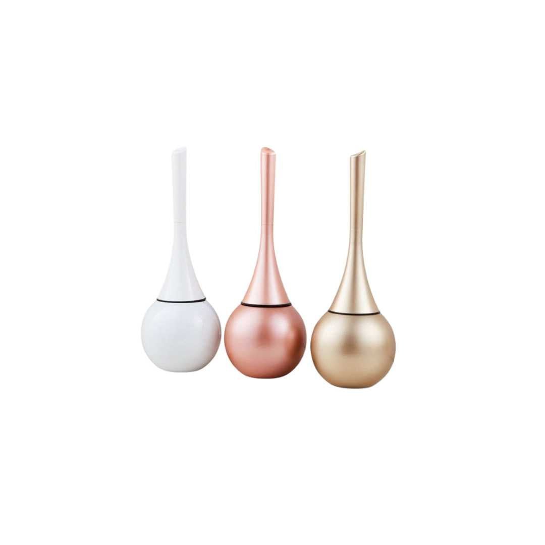 Flexible cleaning head toilet brush in a sleek gold design, perfect for deep bathroom hygiene.