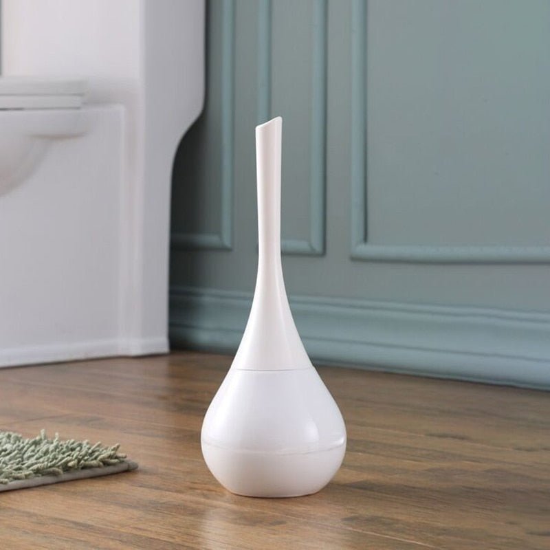 Sleek silver toilet brush with flexible silicone bristles, enhancing bathroom hygiene & modern decor.