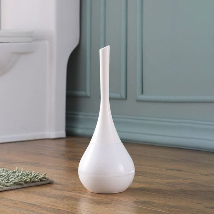 Sleek silver toilet brush with flexible silicone bristles, enhancing bathroom hygiene & modern decor.