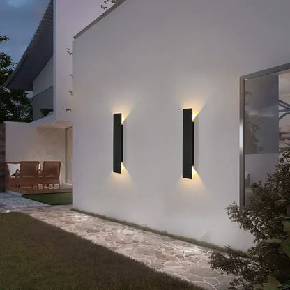 Stylish outdoor wall lamp enhances home appeal with warm white LED. Durable exterior light for garden, patio, or porch.
