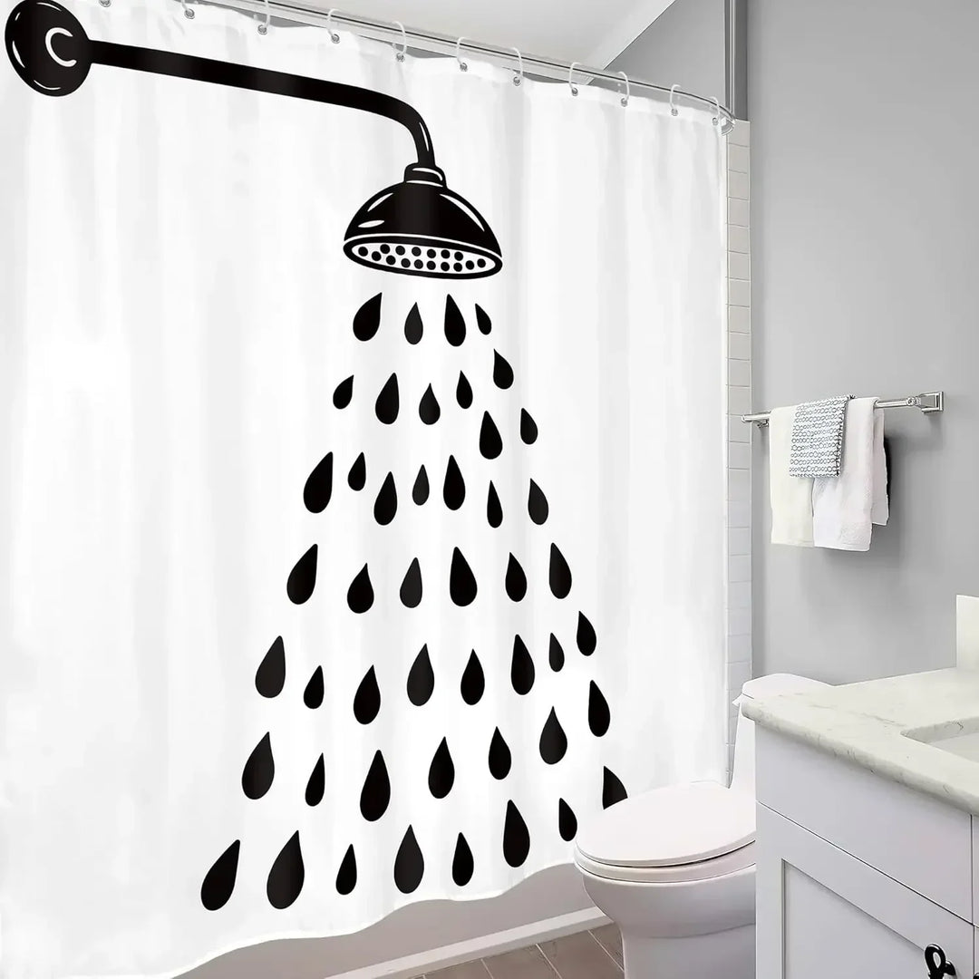 Showerlyn modern shower curtain. Playful drop design, black & white, water resistant polyester for privacy.