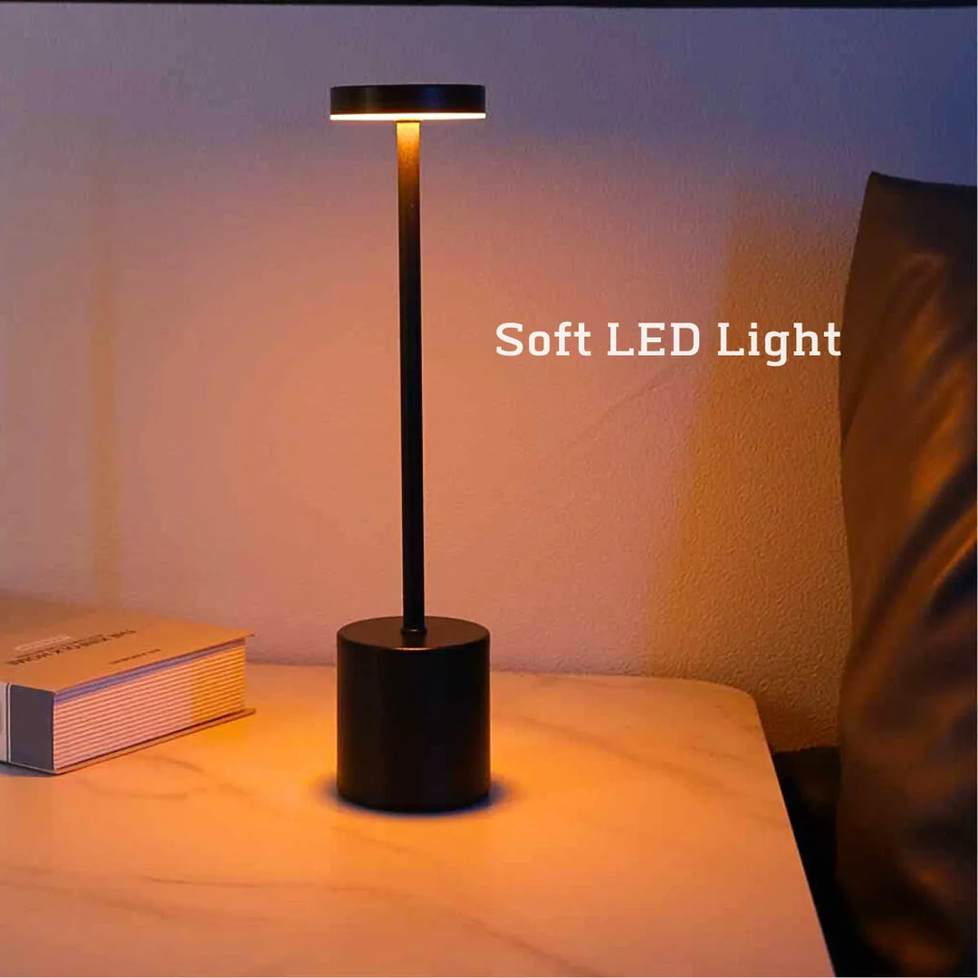 Portable LumiMetal wireless LED lamp, dimmable and rechargeable, perfect for modern home decor & office lighting.