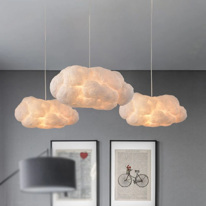 Modern cloud LED pendant light, white PVC/cotton, perfect for living room decor.