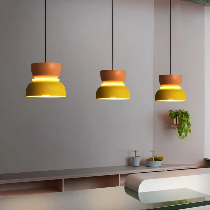 Versatile Macaron LED pendant light, modern colorful fixture suitable for various rooms & styles.