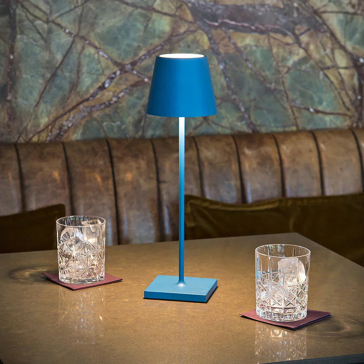 Modern dimmable LED table lamp, rechargeable and cordless. Perfect for desk, bedroom, or living room.