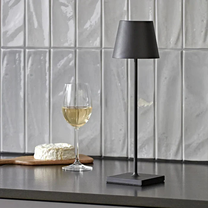 Illuminate your space with this modern dimmable LED table lamp, rechargeable and portable lighting.