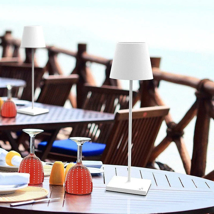 Modern office dimmable desk lamp, rechargeable LED, sleek aluminum design with touch control.