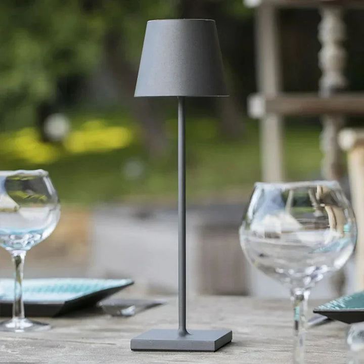 Sleek aluminum modern table lamp, dimmable LED, touch control. Ideal for office desk or home lighting.