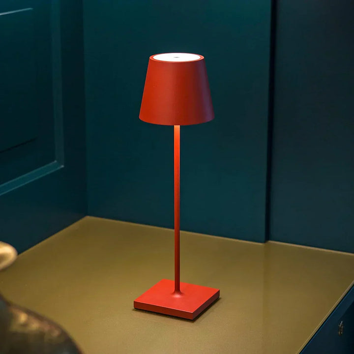 Cordless rechargeable LED table lamp, portable dimmable lighting. Great for bedroom, desk, or outdoor use.