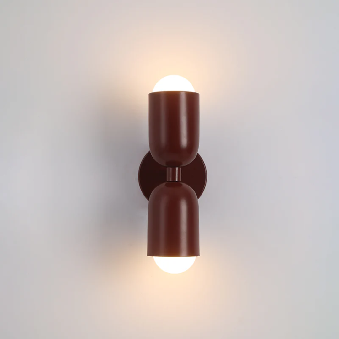 Decorative LED wall light with a vibrant double-sided glow, perfect for modern home interiors.